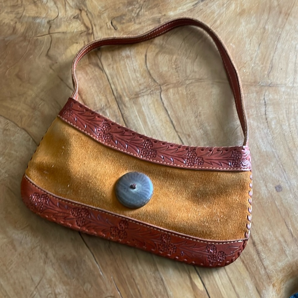 Leaders in leather tooled leather suede purse bag